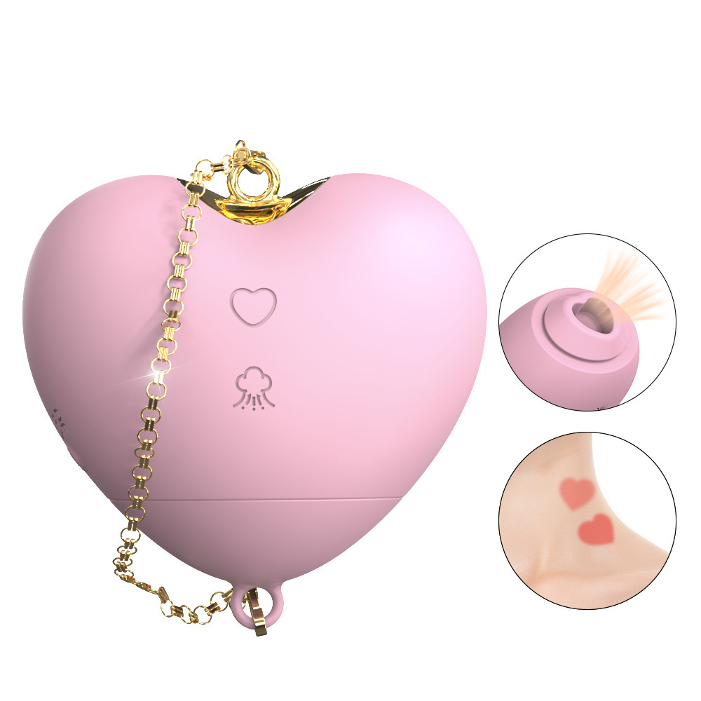 Cupid's Heart heart-shaped suction vibrator in pink with gold chain charm