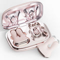 Rabbit Pods vibrating nipple clamps in pink with open charging case